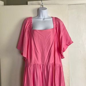 Pink long summery breezy dress. Open back with a tie.